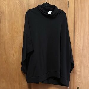 Classy black funnel neck top